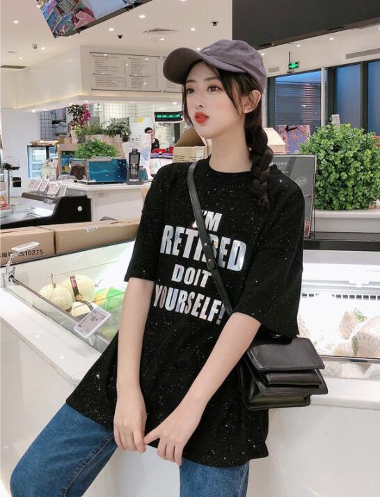 Top da donna T-shirt a maniche corte