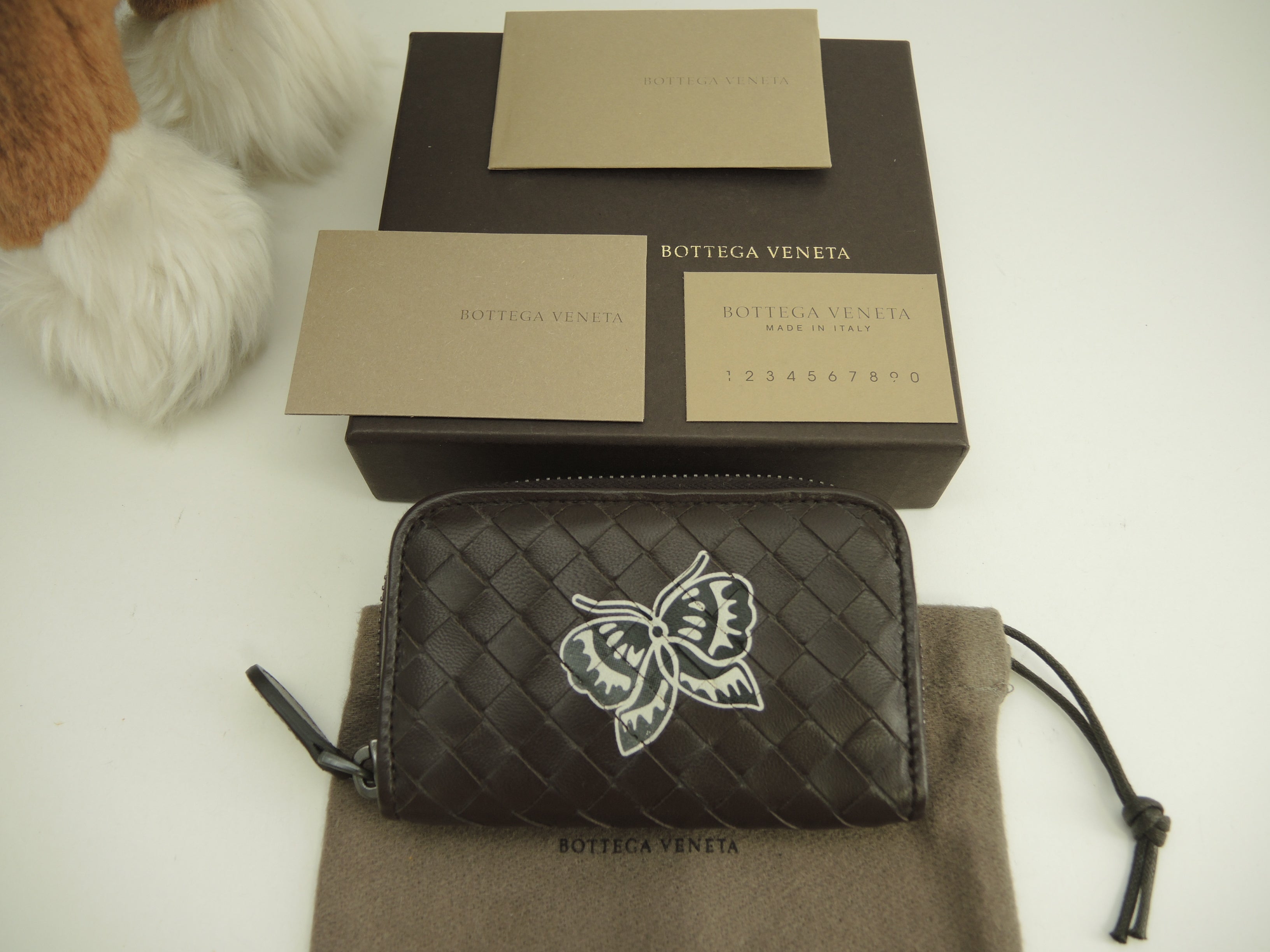 Bottega Veneta - Portamonete rotondo con cerniera in pelle Intrecciato marrone, mai usato @B00501795V