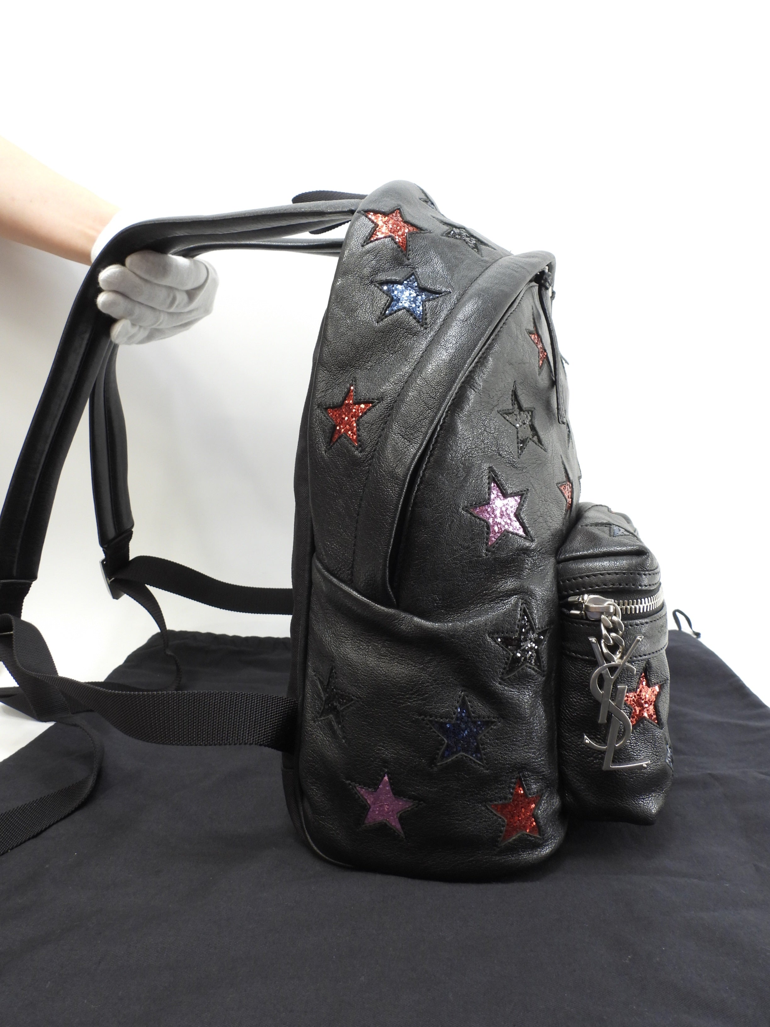 Zaino Saint Laurent City YSL in pelle glitterata con stelle, nero, usato ma in ottime condizioni @LY454319-1016