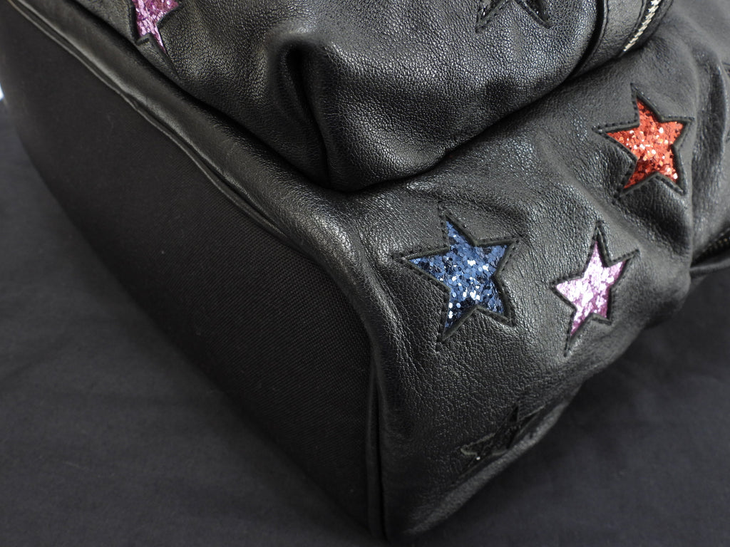 Zaino Saint Laurent City YSL in pelle glitterata con stelle, nero, usato ma in ottime condizioni @LY454319-1016