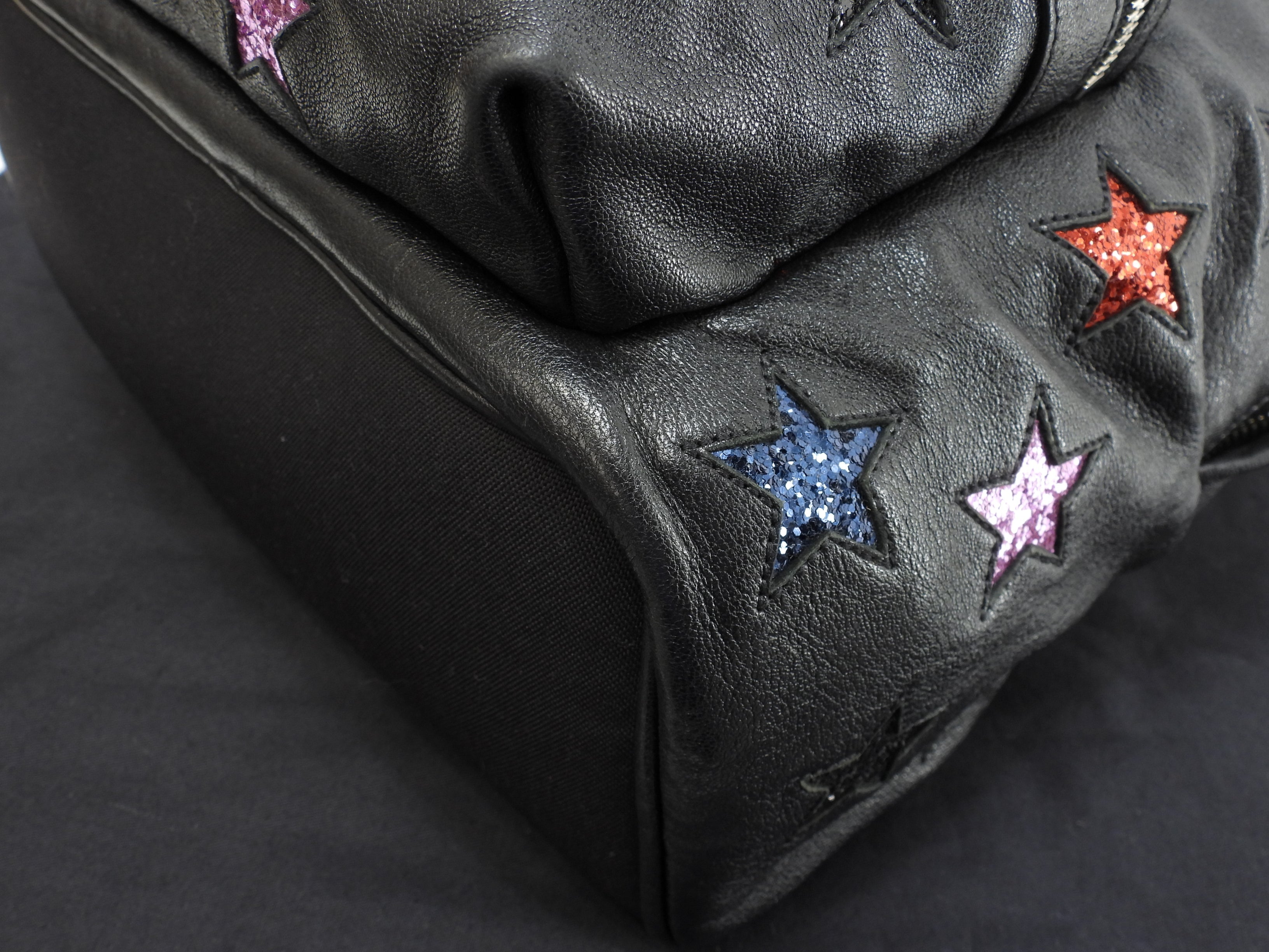 Zaino Saint Laurent City YSL in pelle glitterata con stelle, nero, usato ma in ottime condizioni @LY454319-1016