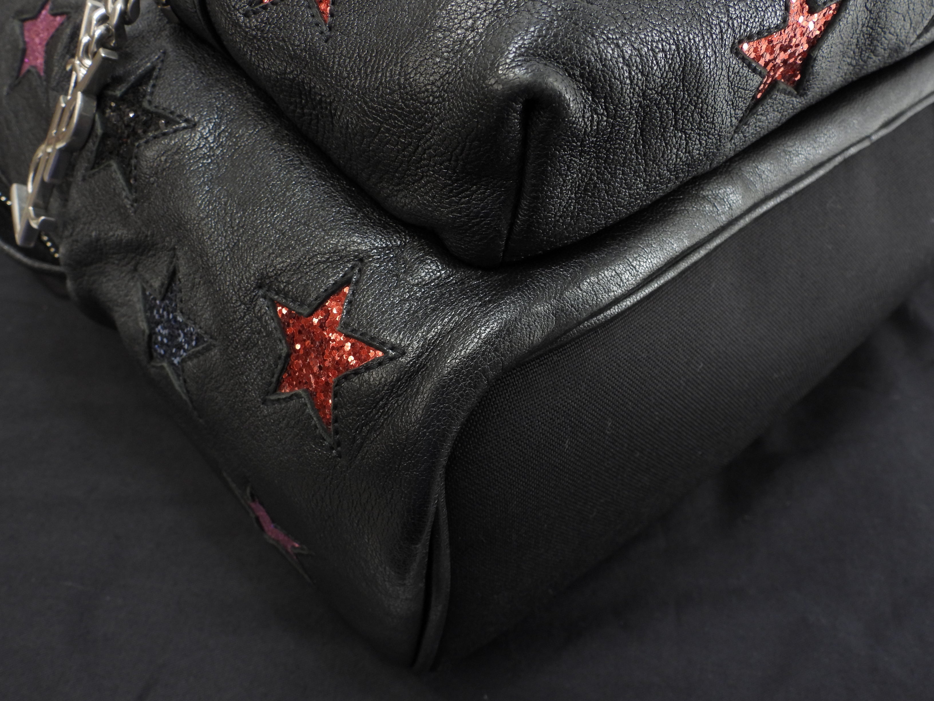Zaino Saint Laurent City YSL in pelle glitterata con stelle, nero, usato ma in ottime condizioni @LY454319-1016