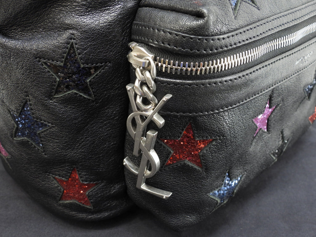 Zaino Saint Laurent City YSL in pelle glitterata con stelle, nero, usato ma in ottime condizioni @LY454319-1016