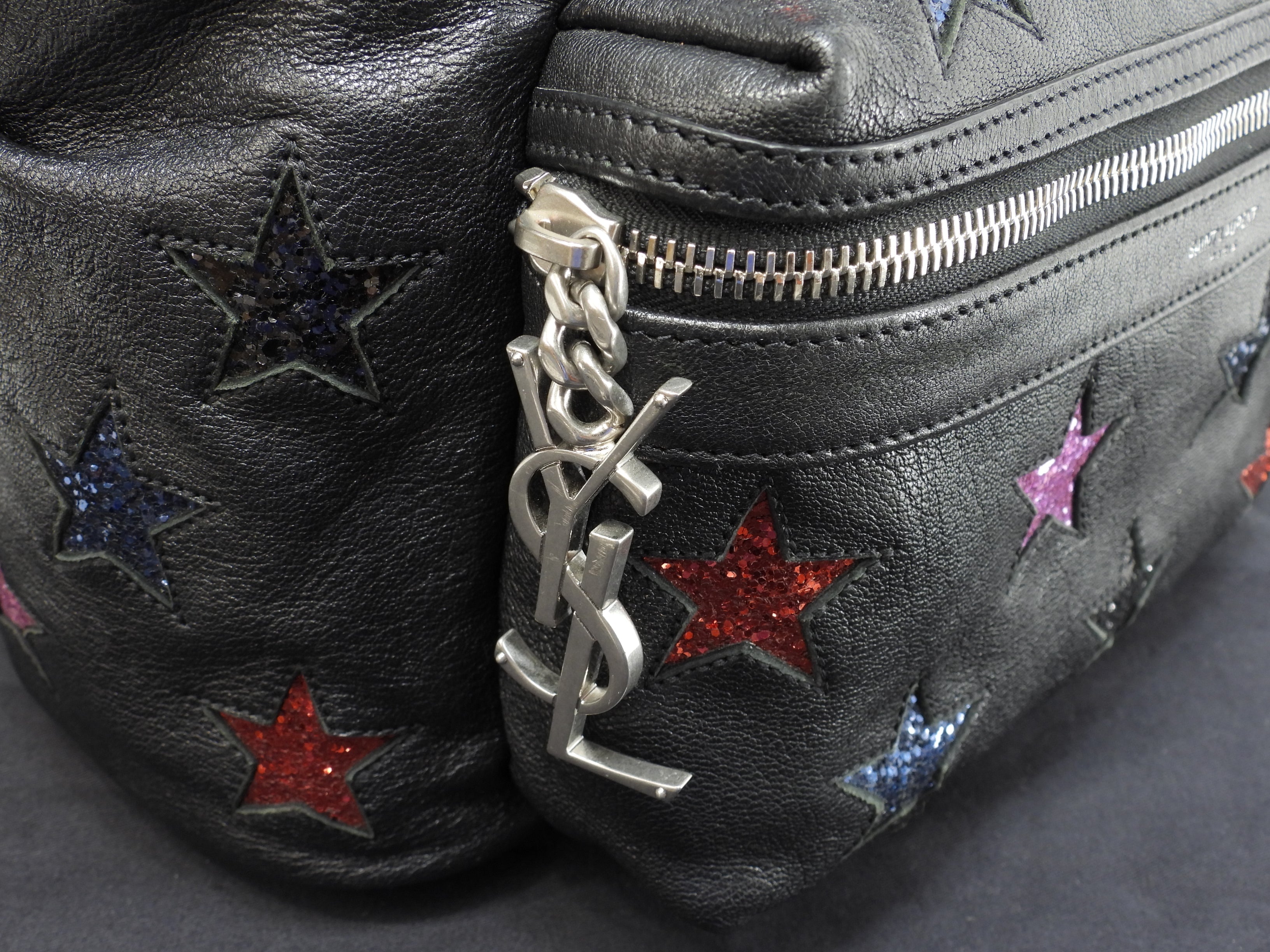 Zaino Saint Laurent City YSL in pelle glitterata con stelle, nero, usato ma in ottime condizioni @LY454319-1016