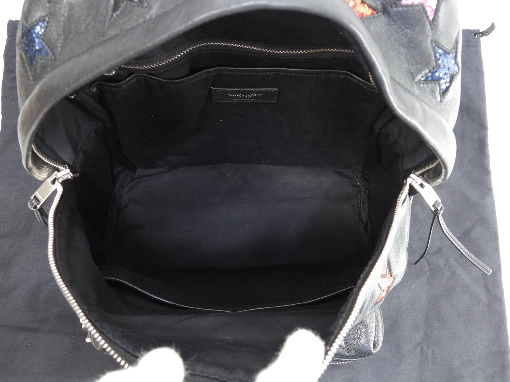 Zaino Saint Laurent City YSL in pelle glitterata con stelle, nero, usato ma in ottime condizioni @LY454319-1016