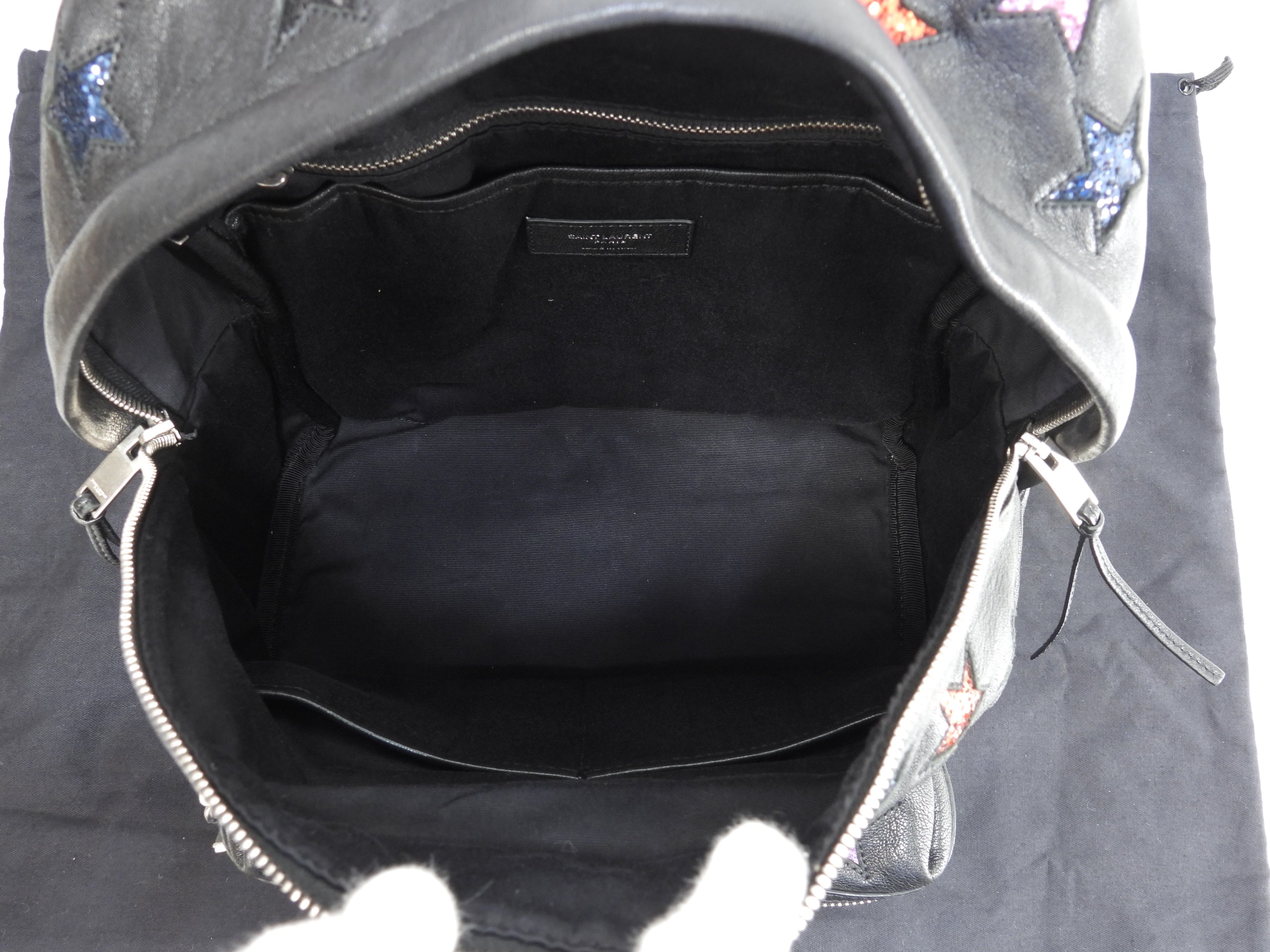 Zaino Saint Laurent City YSL in pelle glitterata con stelle, nero, usato ma in ottime condizioni @LY454319-1016
