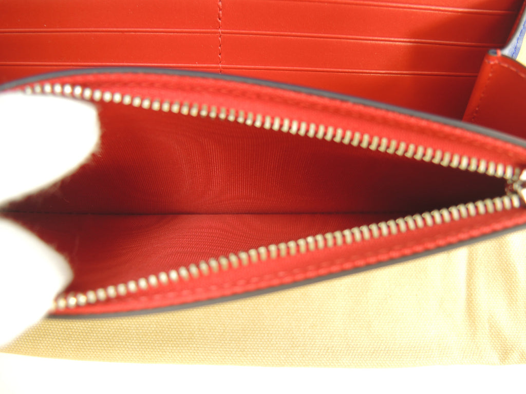 Christian Louboutin Macaron Pochette Portafoglio in pelle viola con borchie, nuovo con cartellino