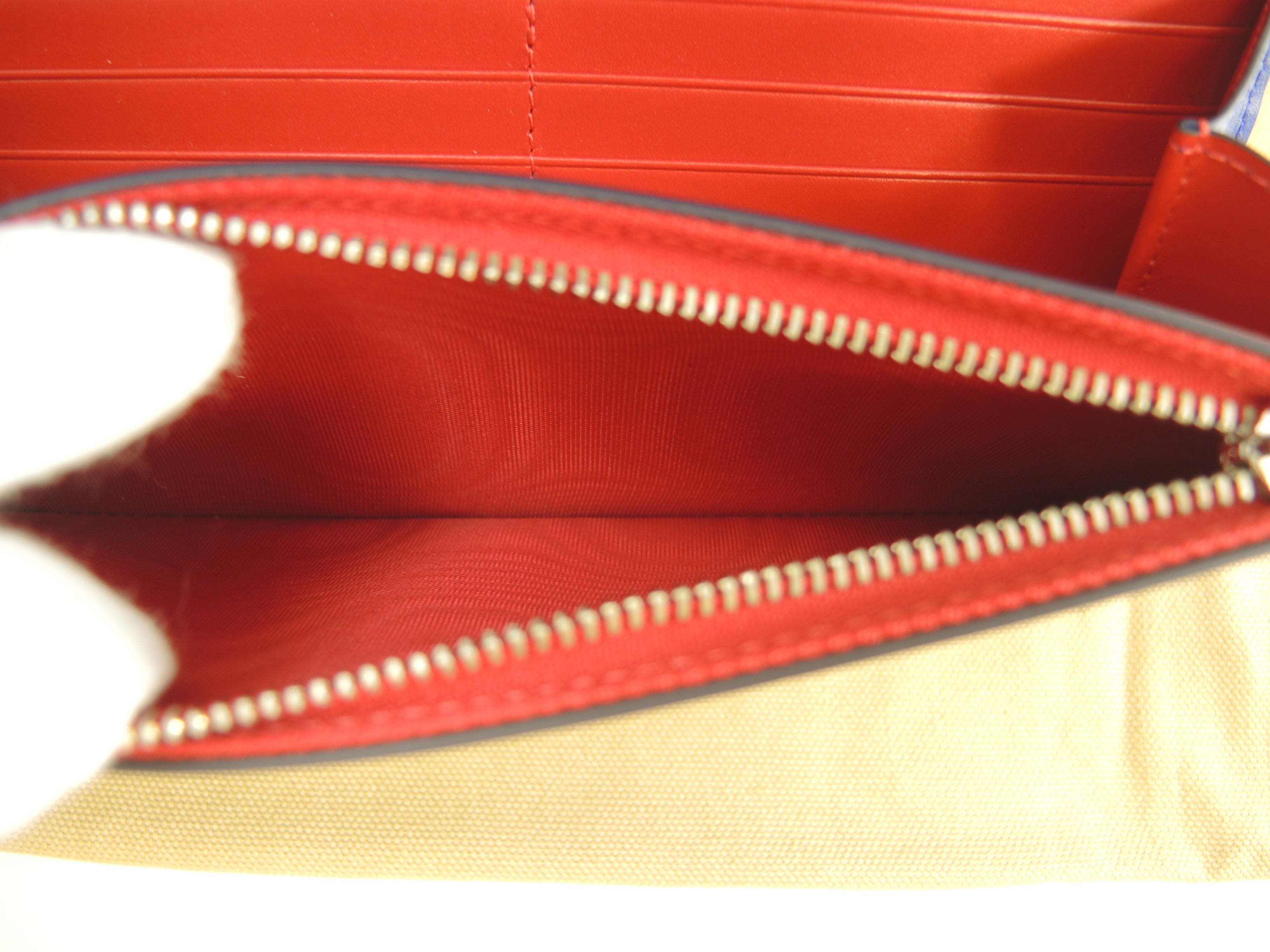 Christian Louboutin Macaron Pochette Portafoglio in pelle viola con borchie, nuovo con cartellino