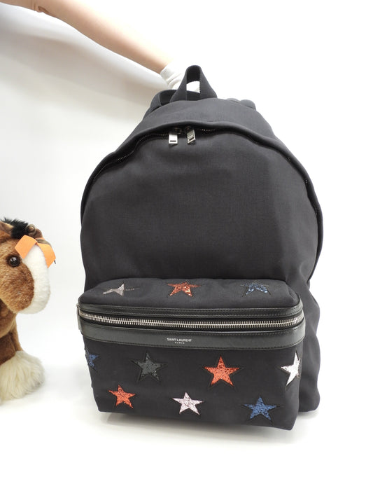 Zaino Saint Laurent con stelle in nylon e pelle nera, borsa a tracolla, in ottime condizioni @ 3