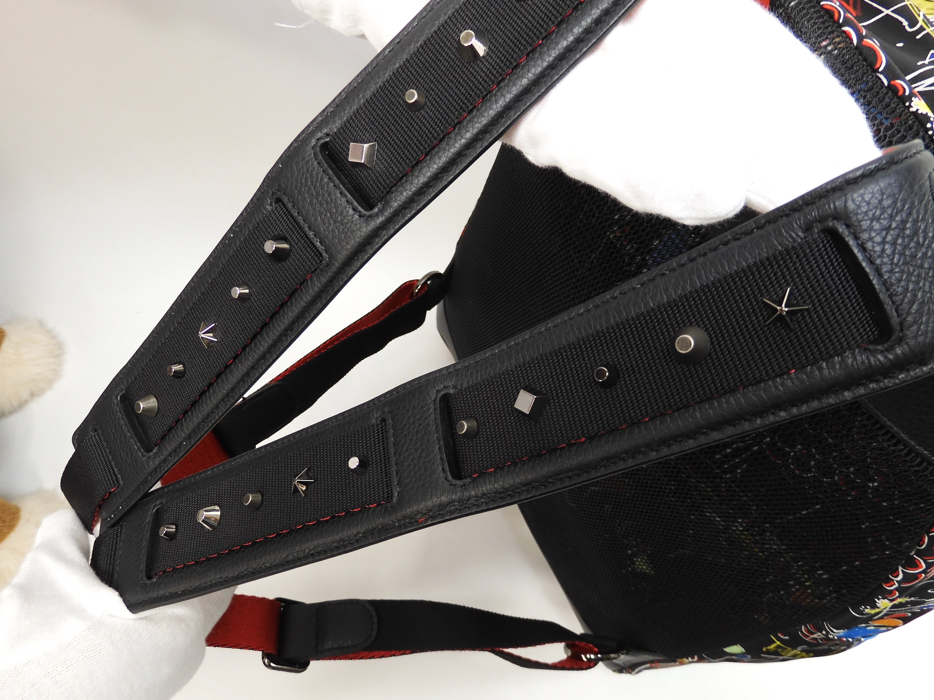 Zaino Christian Louboutin con fibbie in edizione limitata, in nylon e pelle nera @ 1