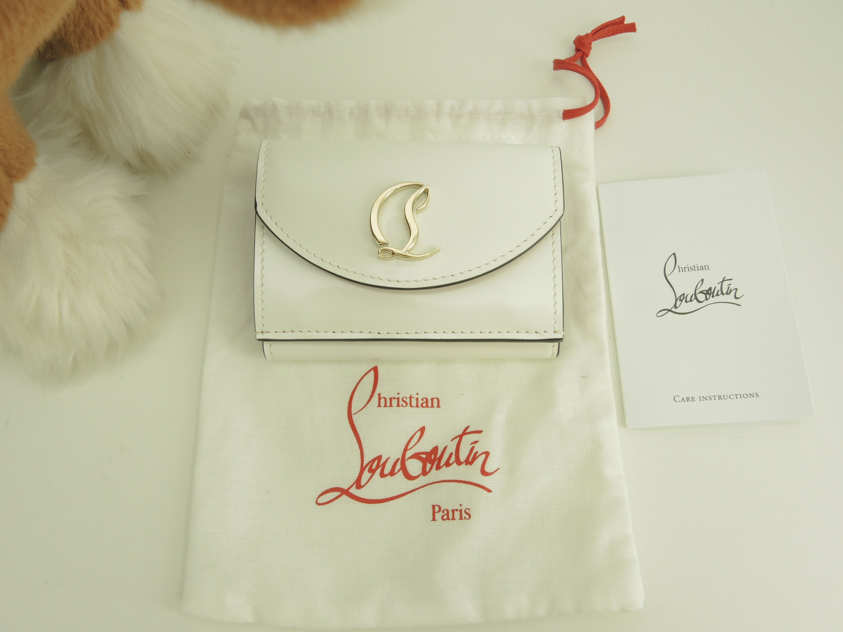 Christian Louboutin portafoglio mini a 3 ante Loubi54 pelle verniciata bianca portafoglio compatto inutilizzato @ 2