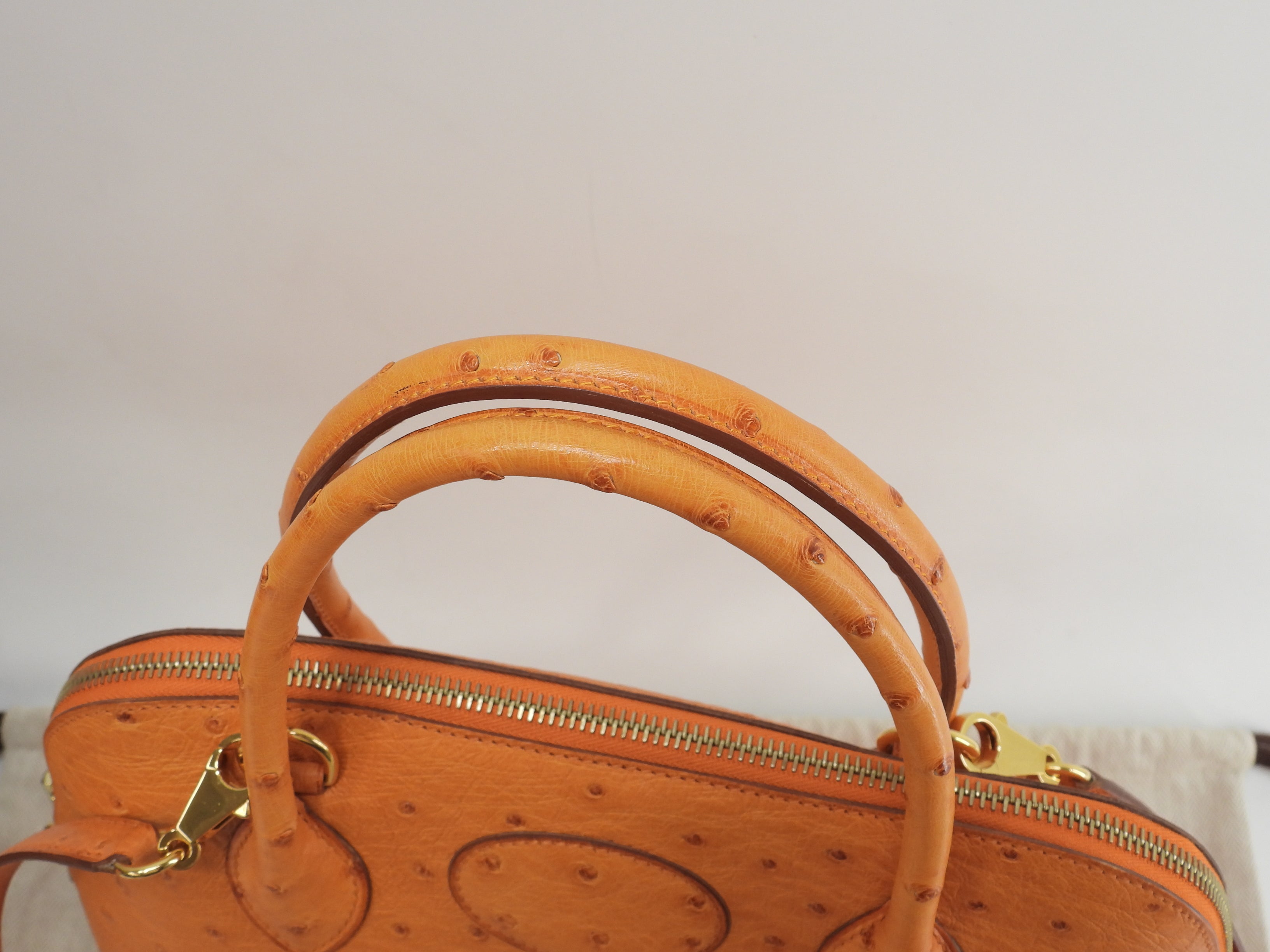 Hermes Bolide 31 Struzzo arancione metalleria oro con tracolla borsa a mano usato in condizioni eccellenti @□F