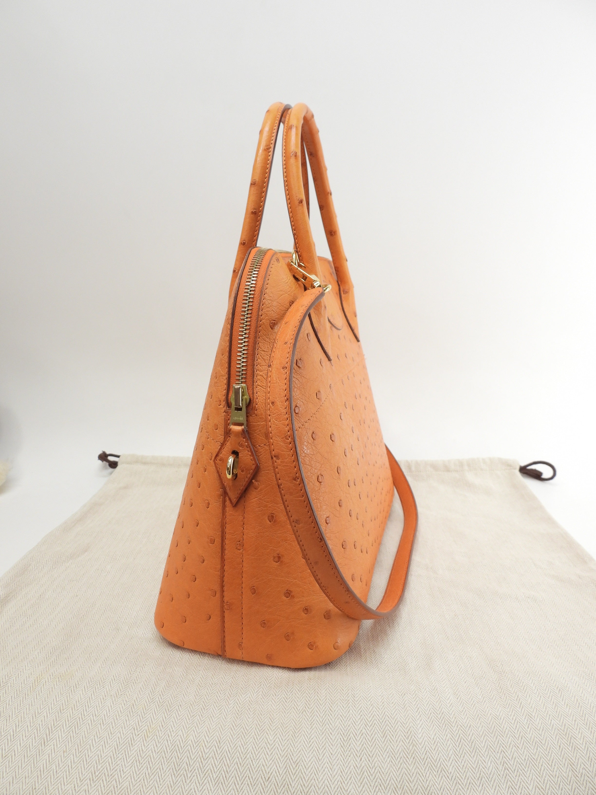 Hermes Bolide 31 Struzzo arancione metalleria oro con tracolla borsa a mano usato in condizioni eccellenti @□F