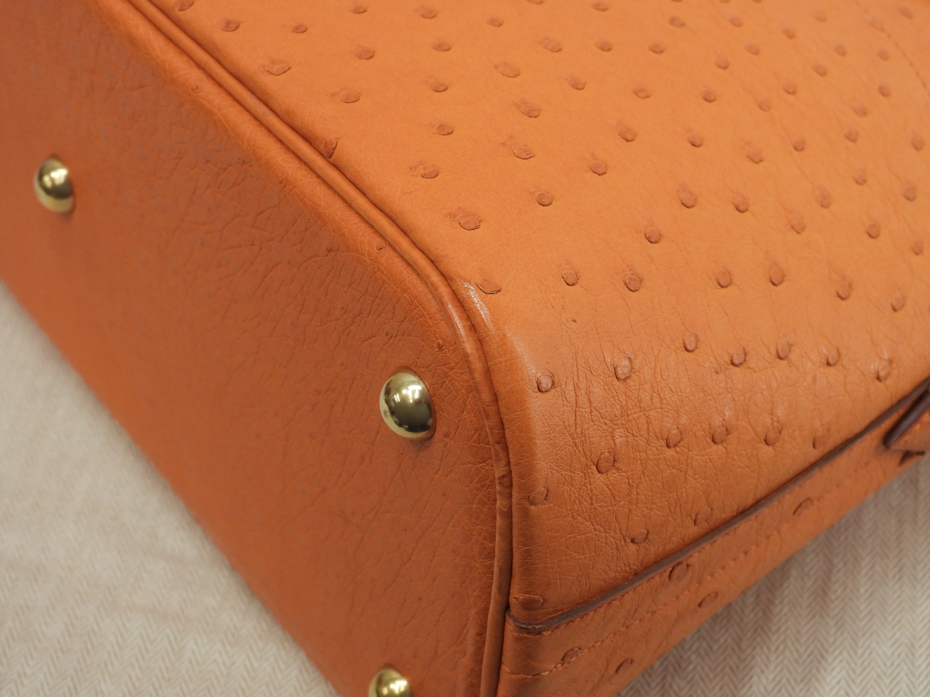 Hermes Bolide 31 Struzzo arancione metalleria oro con tracolla borsa a mano usato in condizioni eccellenti @□F
