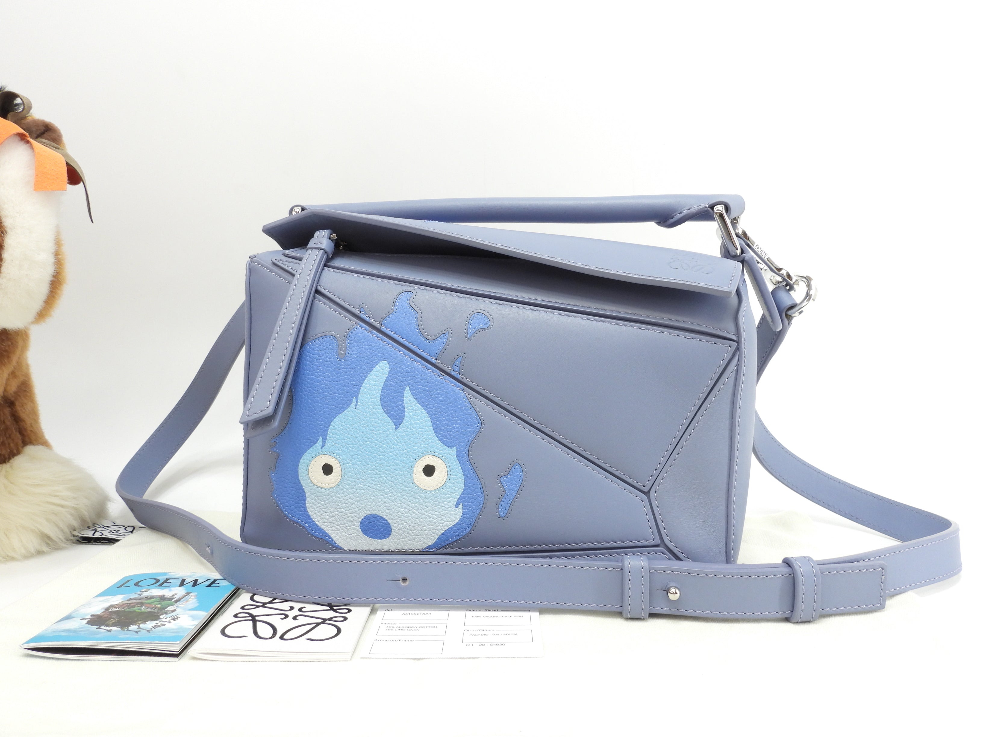 Borsa Loewe Puzzle piccola Il castello errante di Howl/Calcifer, in pelle blu, borsa a mano, pochette, mai usata @012251