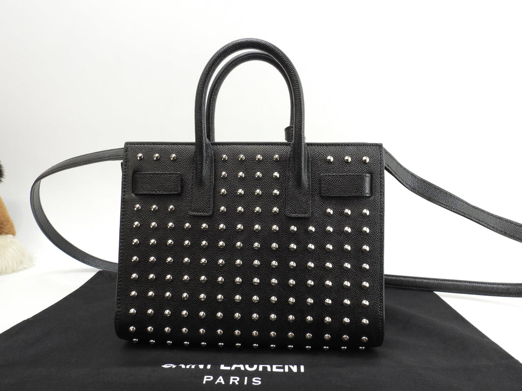 Saint Laurent Sac de Jour Nano con borchie in pelle nera, mini borsa a mano, pochette YSL, ottime condizioni @ 73