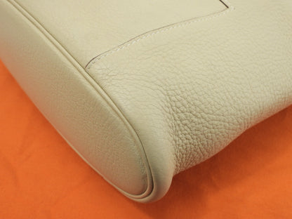 Hermes Good News PM in pelle Taurillon Clemence, colore Parchemin, pochette a tracolla@□L