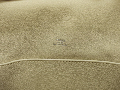 Hermes Good News PM in pelle Taurillon Clemence, colore Parchemin, pochette a tracolla@□L