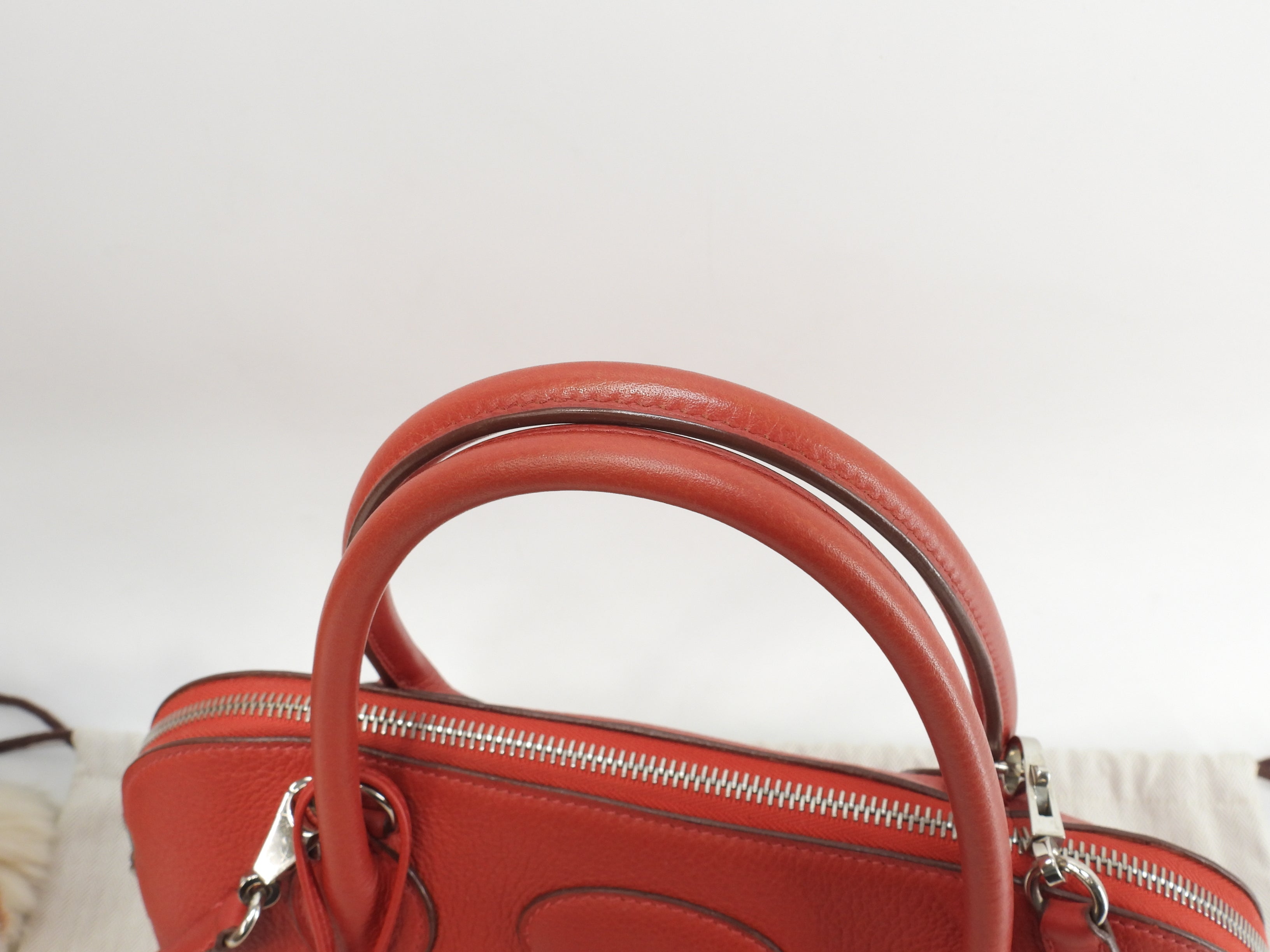 Hermès Bolide 31 Togo rosso, metalleria argentata, con tracolla, condizioni eccellenti @□H