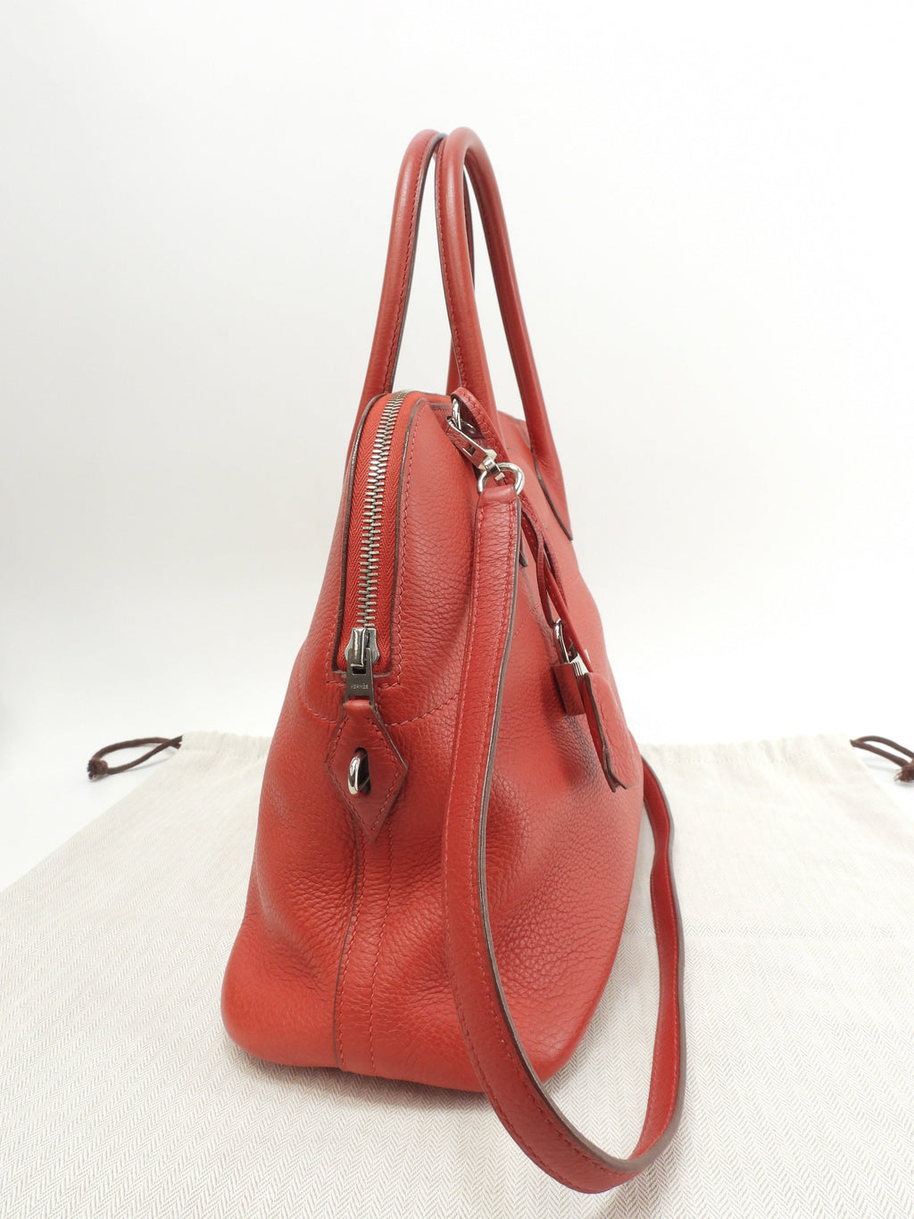 Hermès Bolide 31 Togo rosso, metalleria argentata, con tracolla, condizioni eccellenti @□H