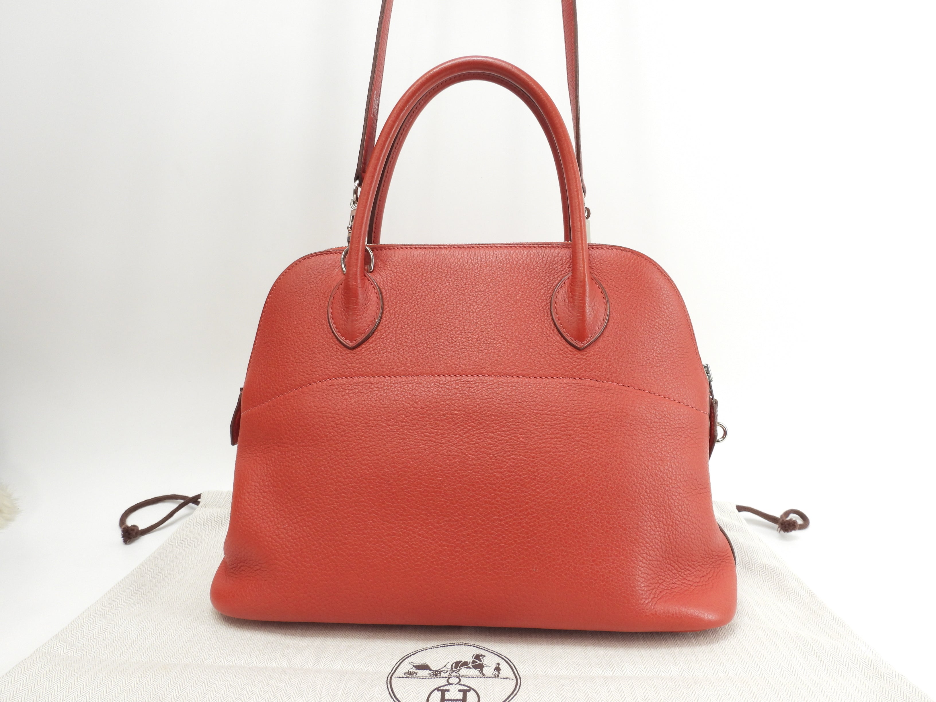 Hermès Bolide 31 Togo rosso, metalleria argentata, con tracolla, condizioni eccellenti @□H