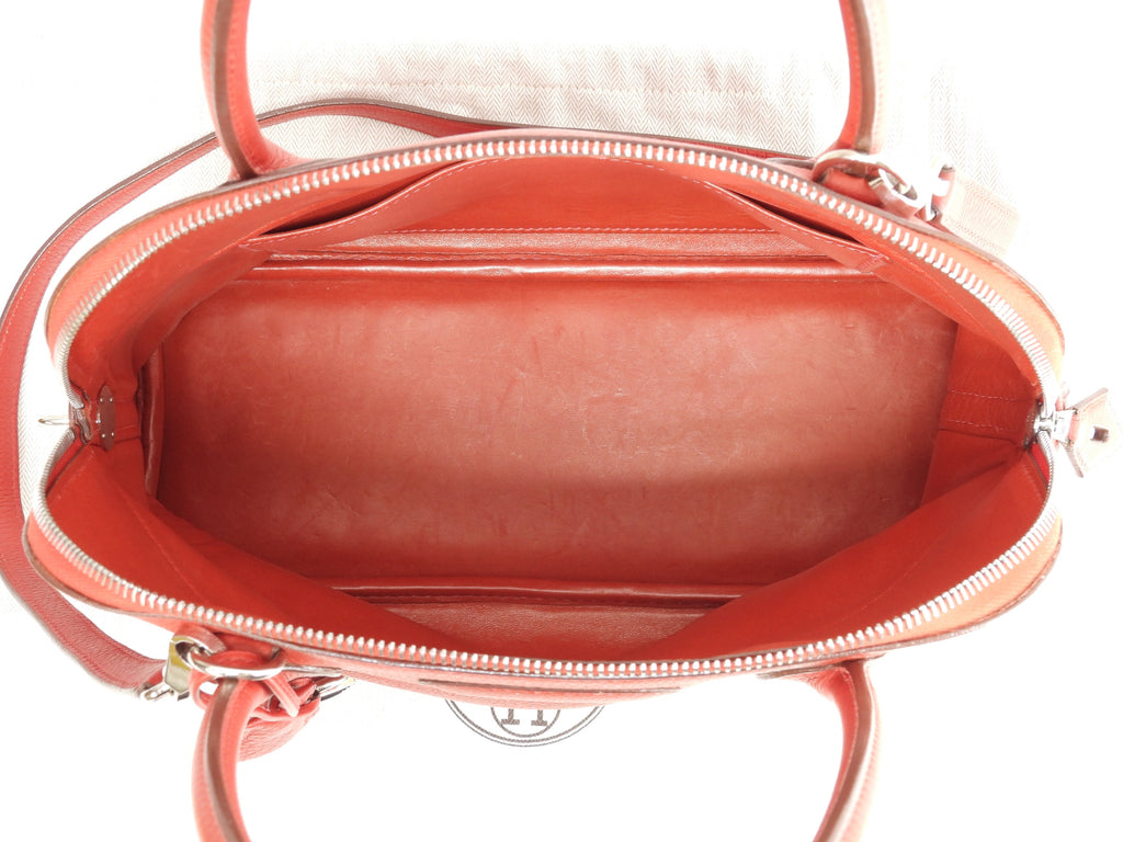 Hermès Bolide 31 Togo rosso, metalleria argentata, con tracolla, condizioni eccellenti @□H