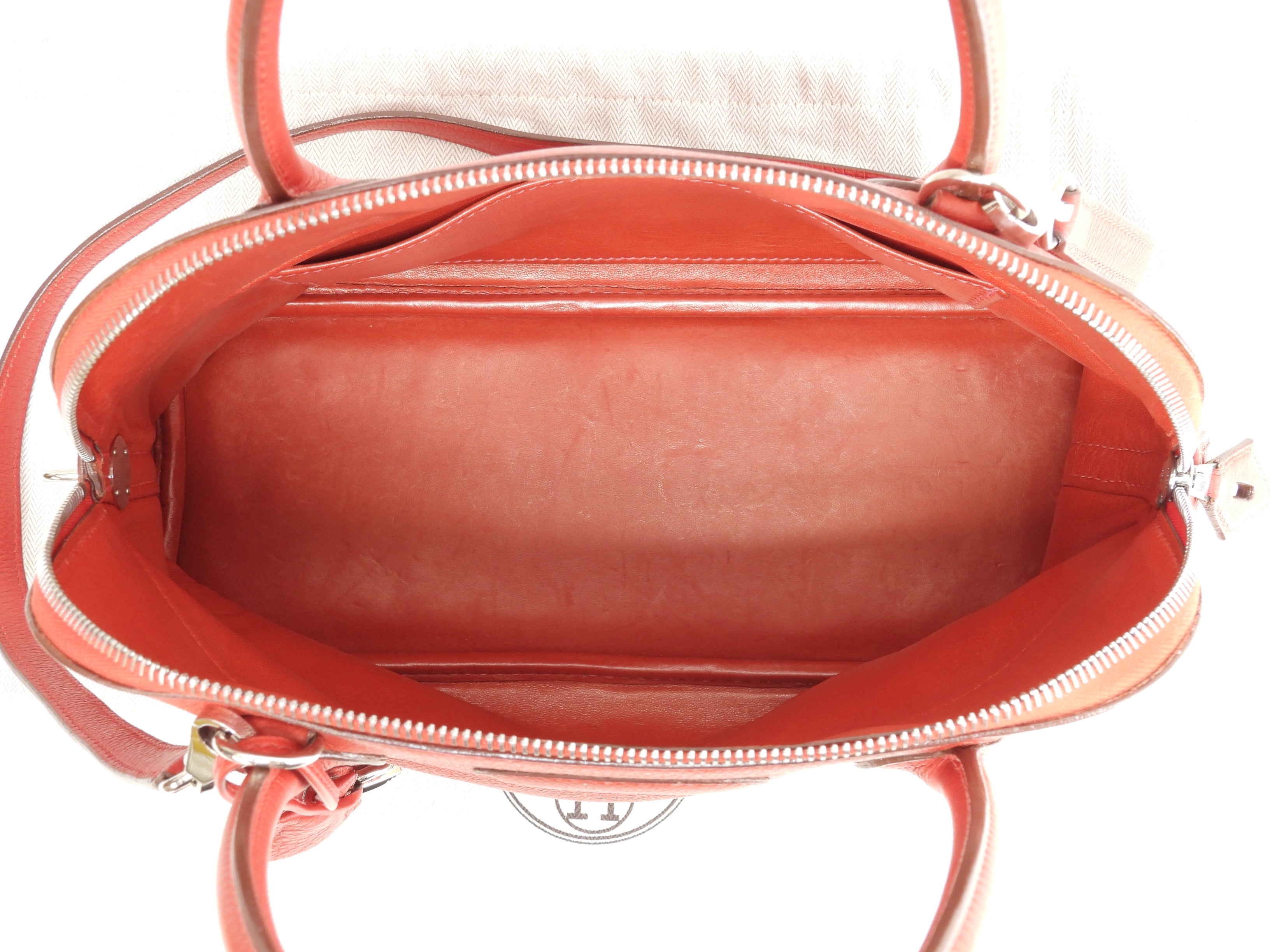 Hermès Bolide 31 Togo rosso, metalleria argentata, con tracolla, condizioni eccellenti @□H