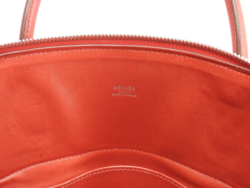 Hermès Bolide 31 Togo rosso, metalleria argentata, con tracolla, condizioni eccellenti @□H