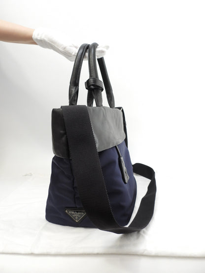 Borsa a mano Prada in nylon/pelle, blu scuro/nero, pochette tote, ottime condizioni@103