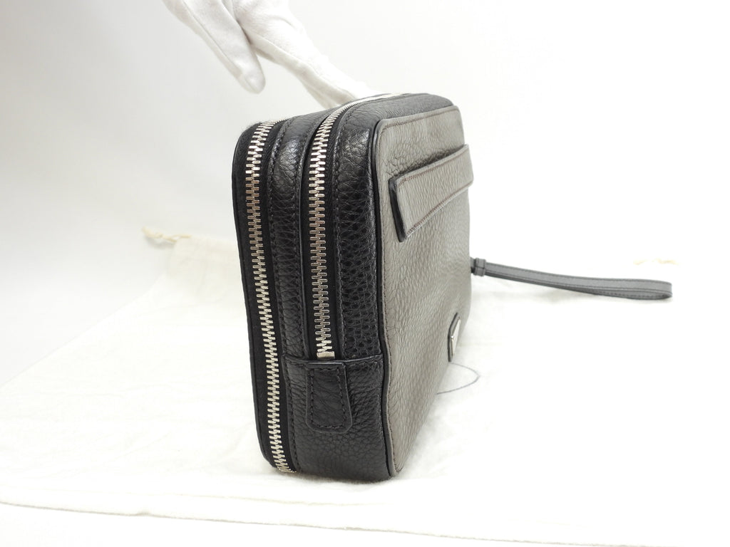 Prada borsetta uomo in pelle grigio/nero, portafoglio a pochette, clutch, ottime condizioni @31/F