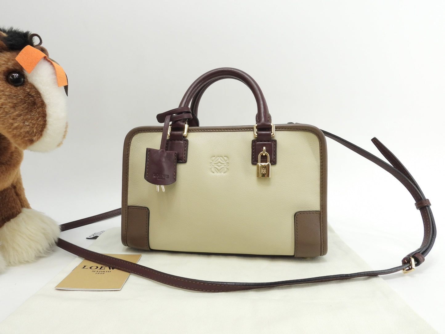 Loewe Amazona 23 in pelle crema/bordeaux, mini borsa a mano, pochette, ottime condizioni @061210