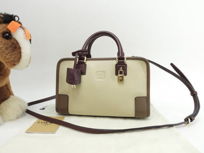 Loewe Amazona 23 in pelle crema/bordeaux, mini borsa a mano, pochette, ottime condizioni @061210