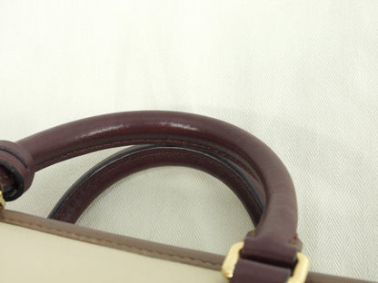 Loewe Amazona 23 in pelle crema/bordeaux, mini borsa a mano, pochette, ottime condizioni @061210