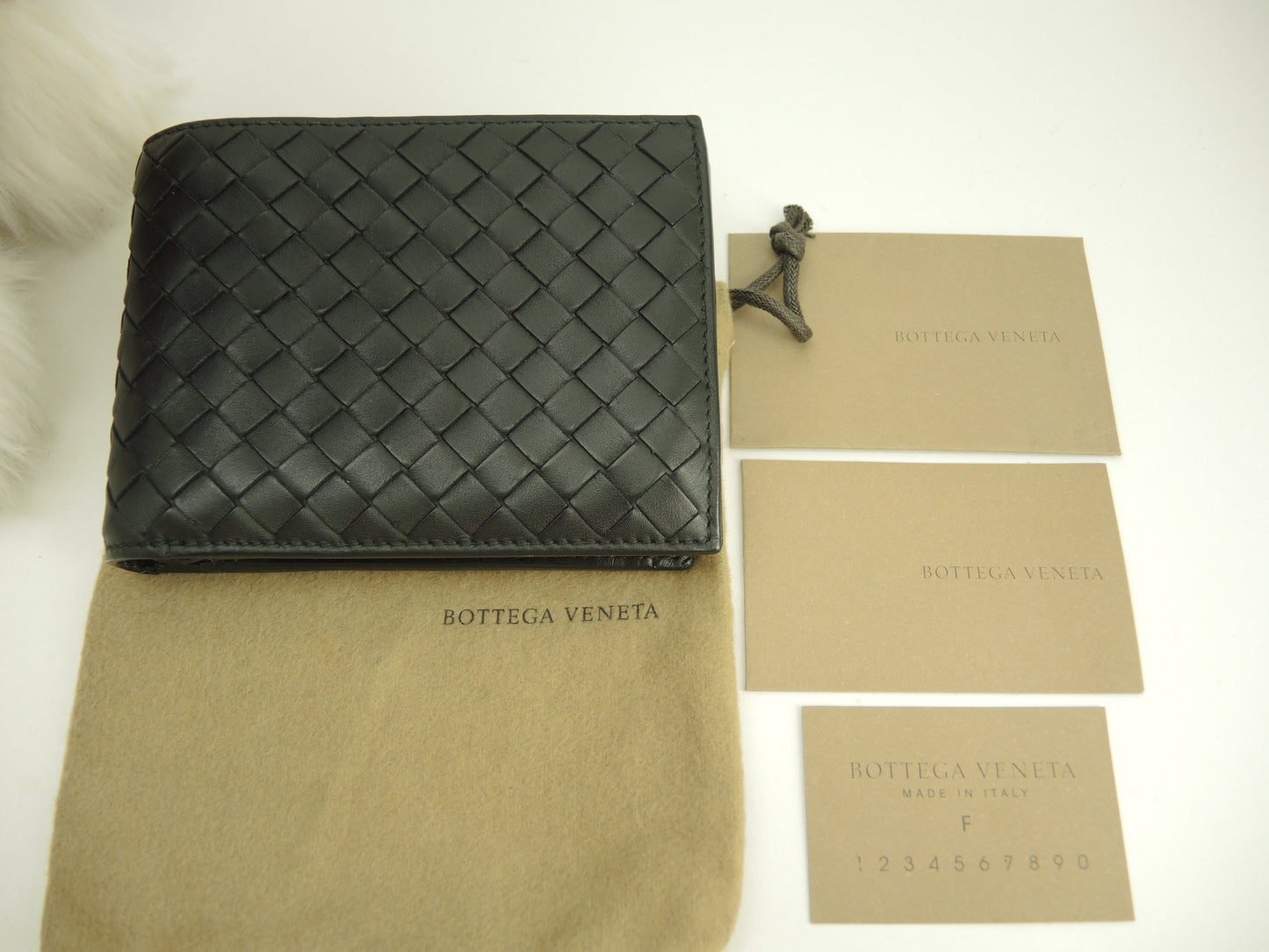 Bottega Veneta, portafoglio a due ante, pelle nera intrecciata, portafoglio compatto @B02598050U