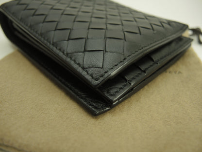 Bottega Veneta, portafoglio a due ante, pelle nera intrecciata, portafoglio compatto @B02598050U