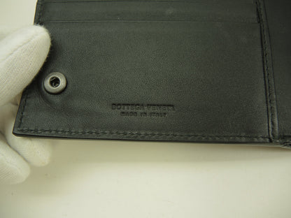 Bottega Veneta, portafoglio a due ante, pelle nera intrecciata, portafoglio compatto @B02598050U