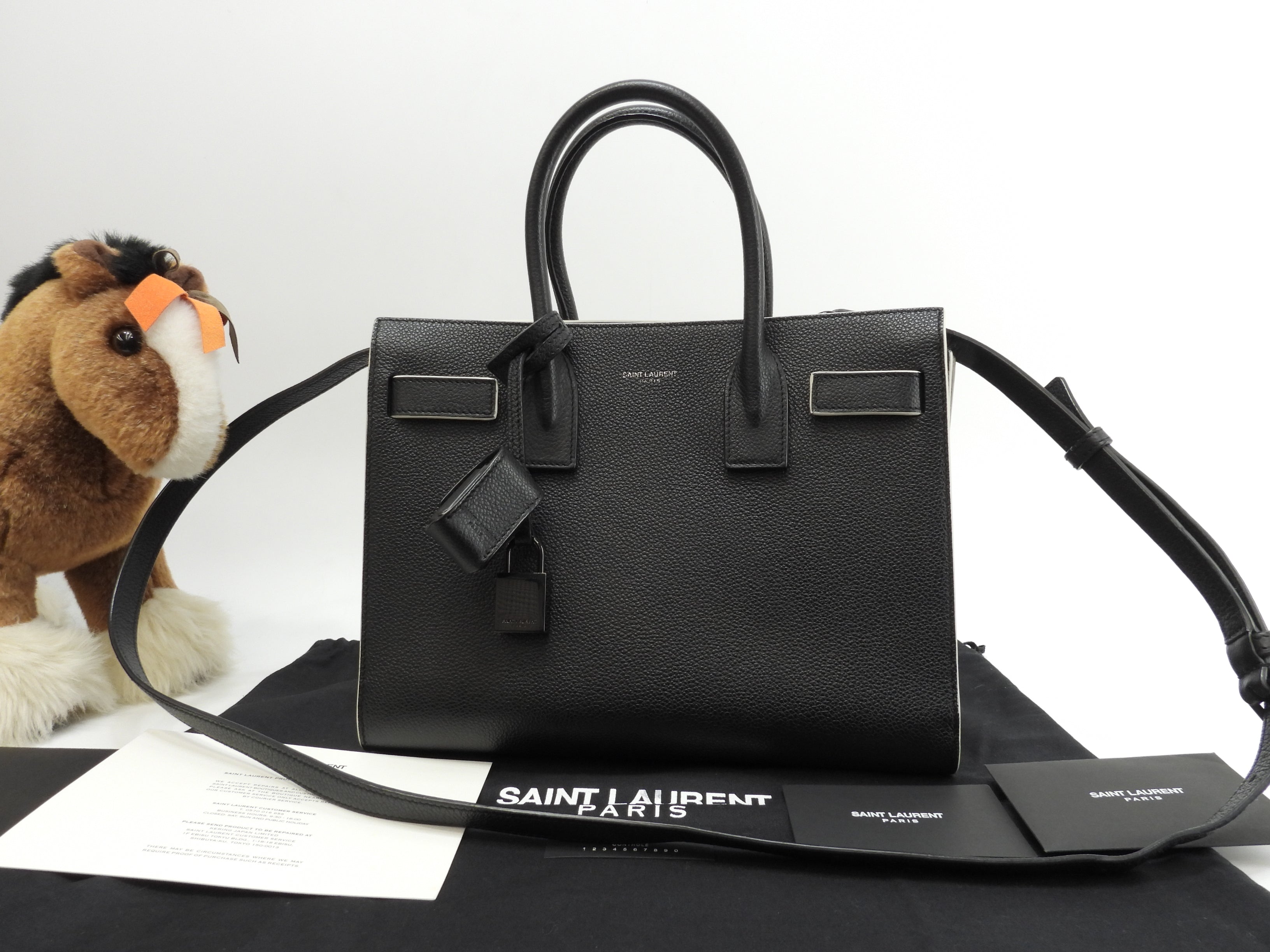 Borsa a mano Saint Laurent Sac de Jour Baby YSL in pelle bianco e nero con tracolla, come nuova @ 88