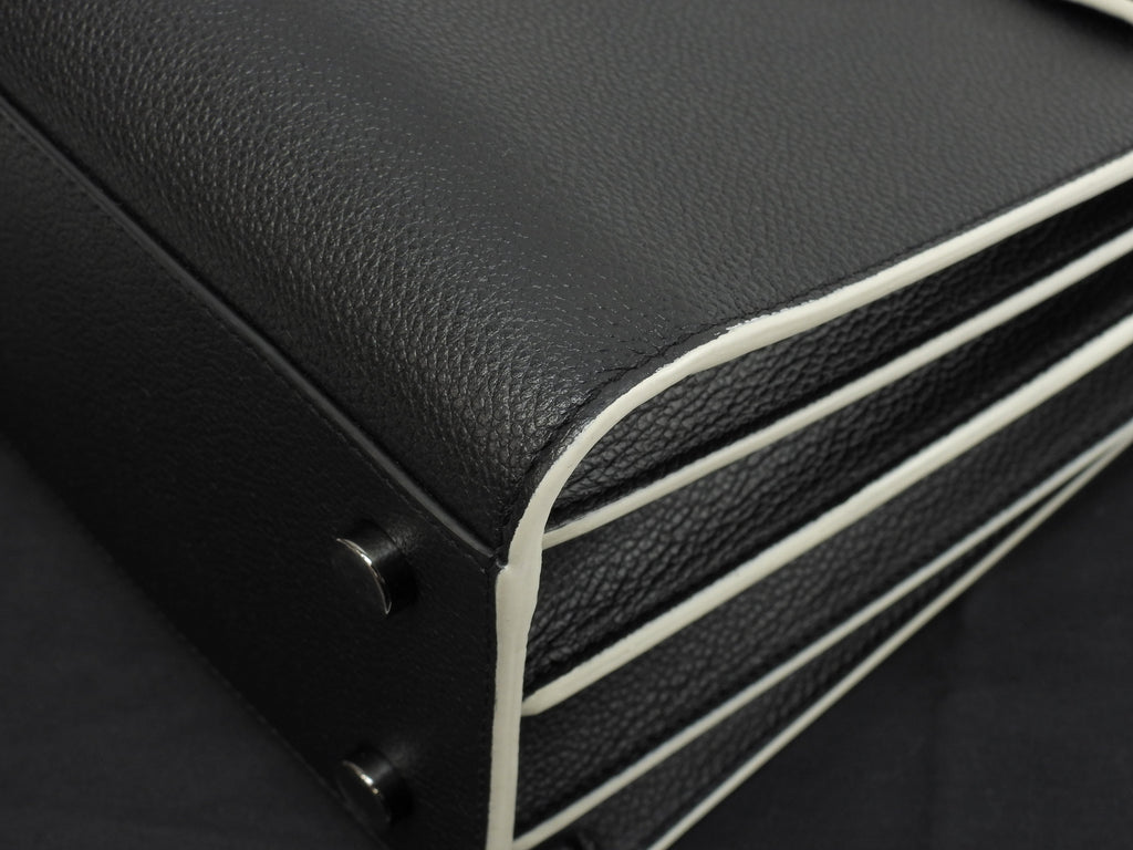 Borsa a mano Saint Laurent Sac de Jour Baby YSL in pelle bianco e nero con tracolla, come nuova @ 88