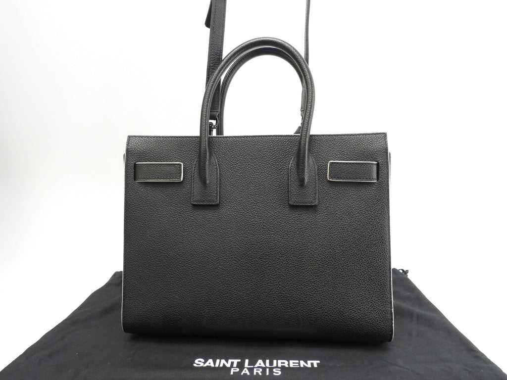 Borsa a mano Saint Laurent Sac de Jour Baby YSL in pelle bianco e nero con tracolla, come nuova @ 88