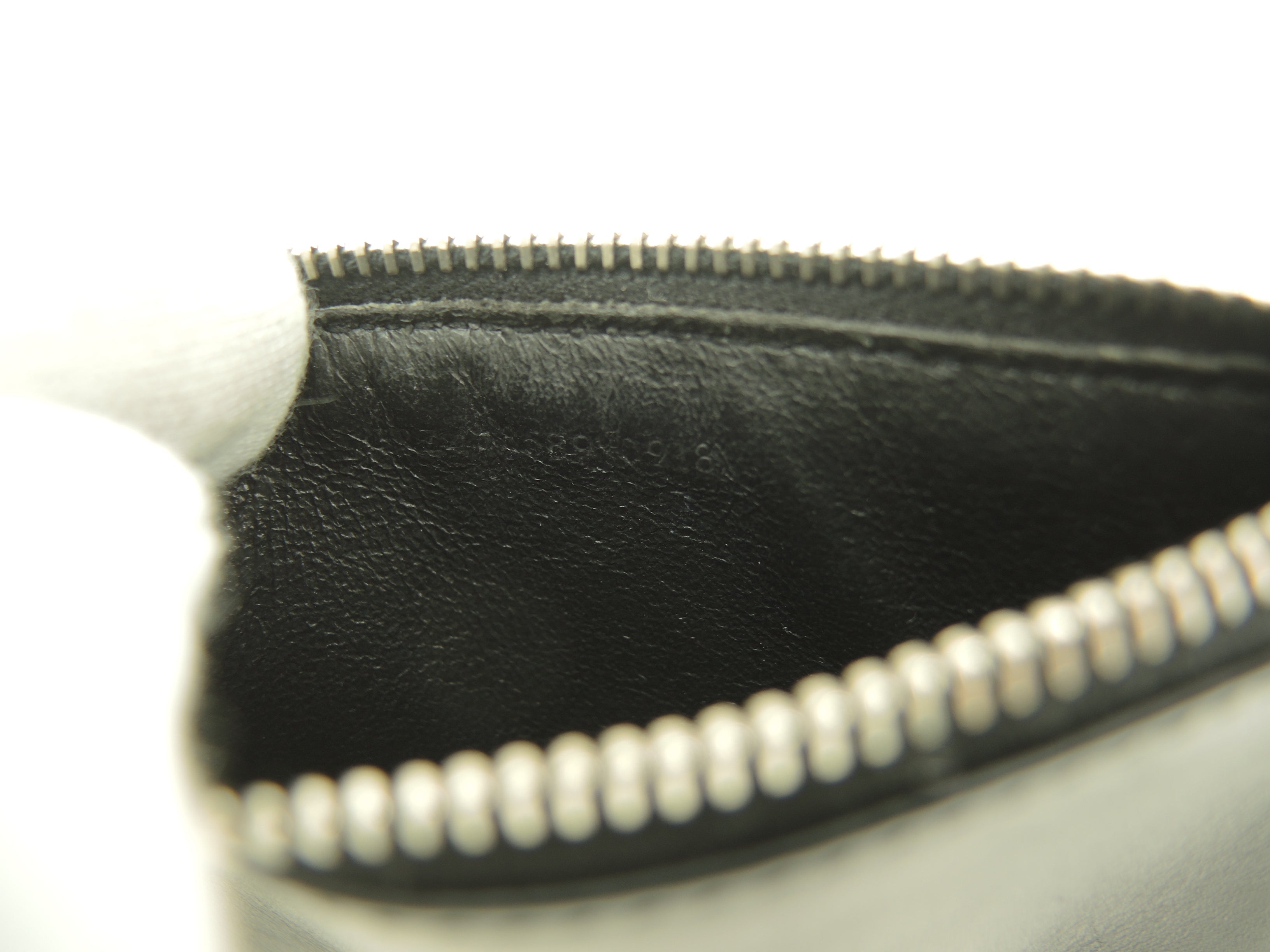 Portamonete Saint Laurent con scomparto per carte di credito YSL in pelle nera con teschio@ 79