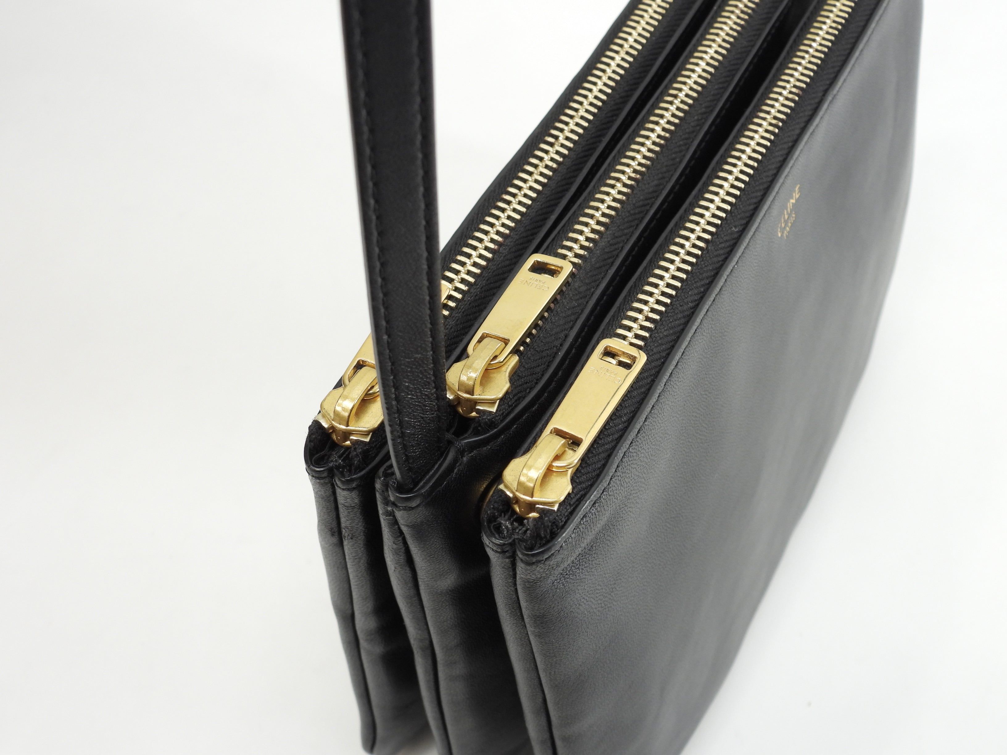 Celine Trio Small in pelle nera con hardware dorato, pochette a tracolla @U-AT-0189