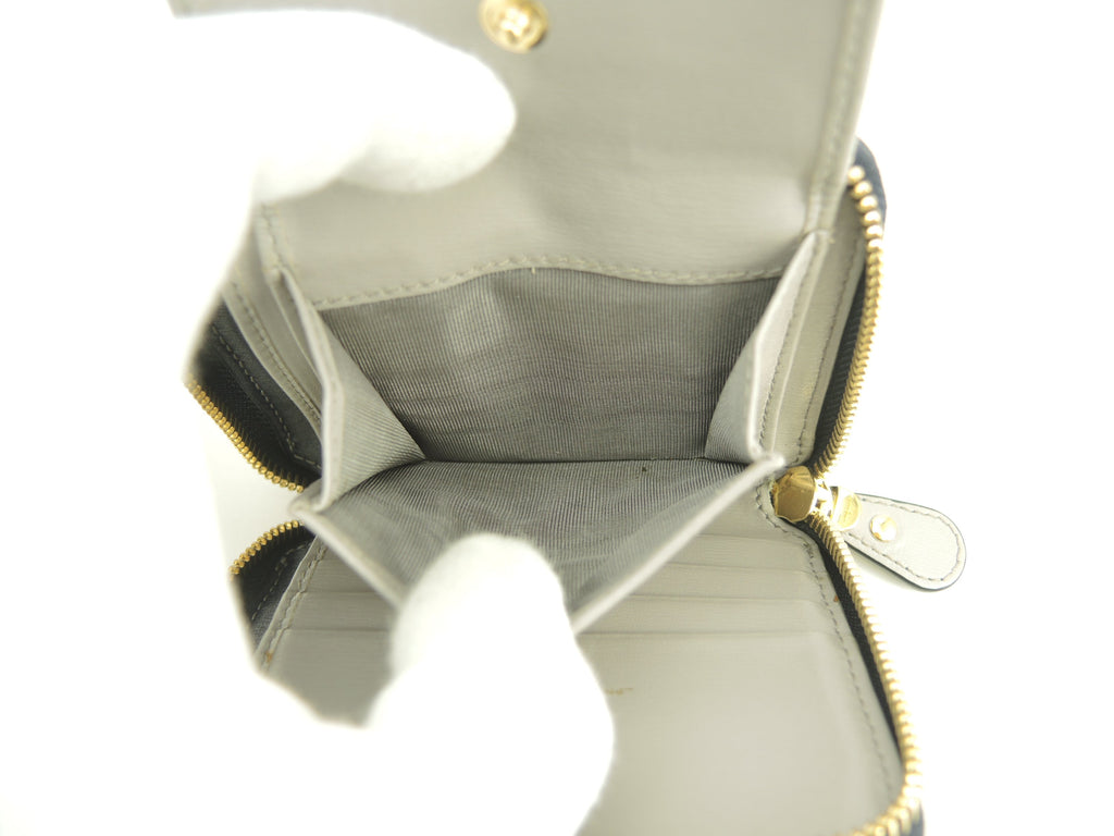 Salvatore Ferragamo Portafoglio compatto Gancini in pelle blu navy con zip piccole@ 18