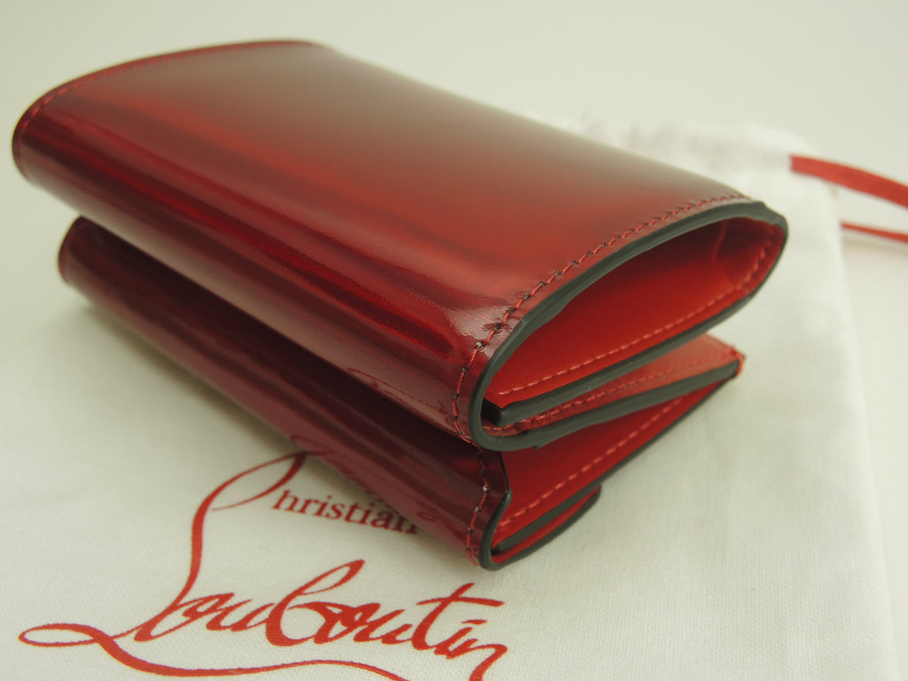 Christian Louboutin, mini portafoglio a tre ante Loubi54 in pelle verniciata rossa, portafoglio compatto, mai usato @ 1