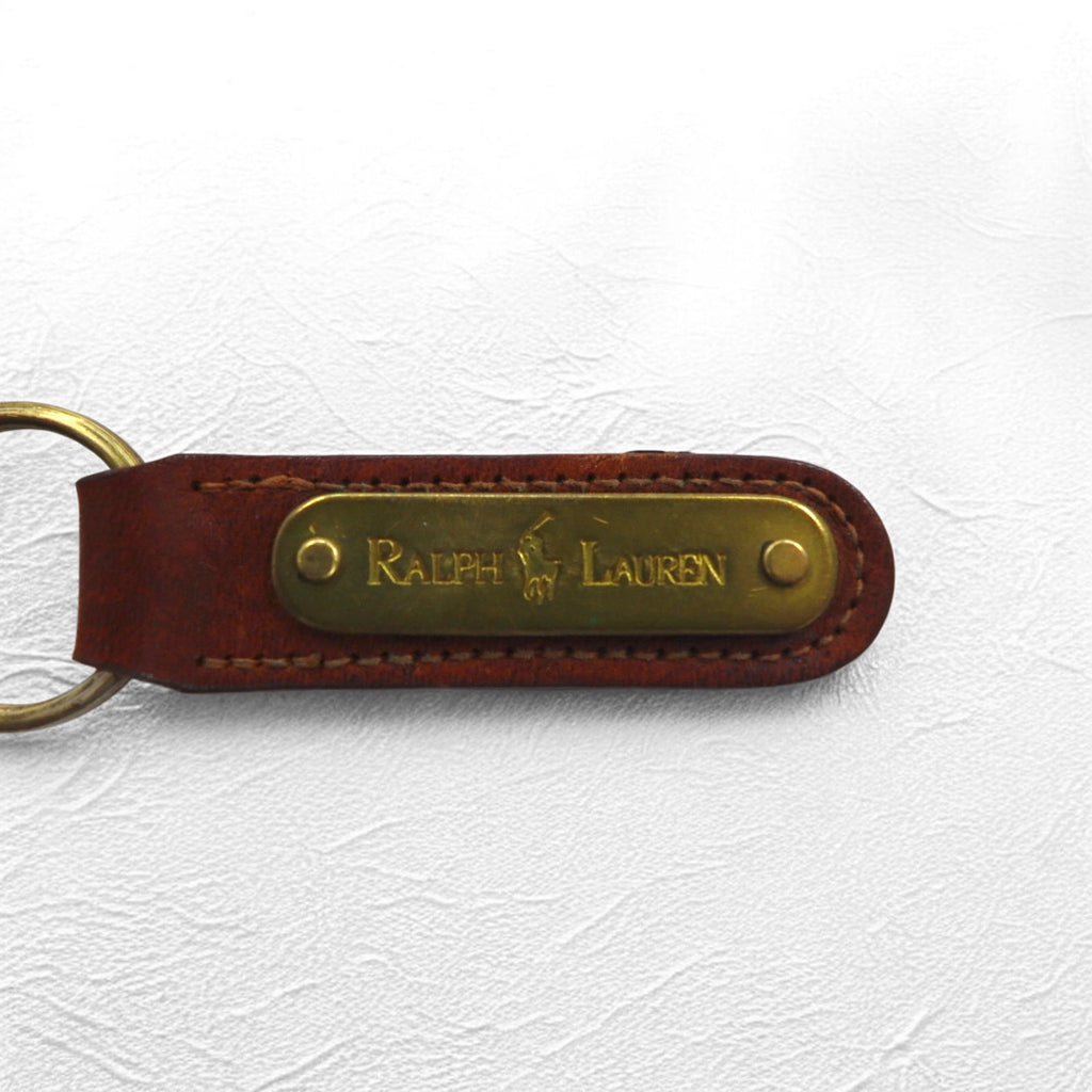 RALPH LAUREN USA Portachiavi in pelle marrone con placca in metallo, mai usato