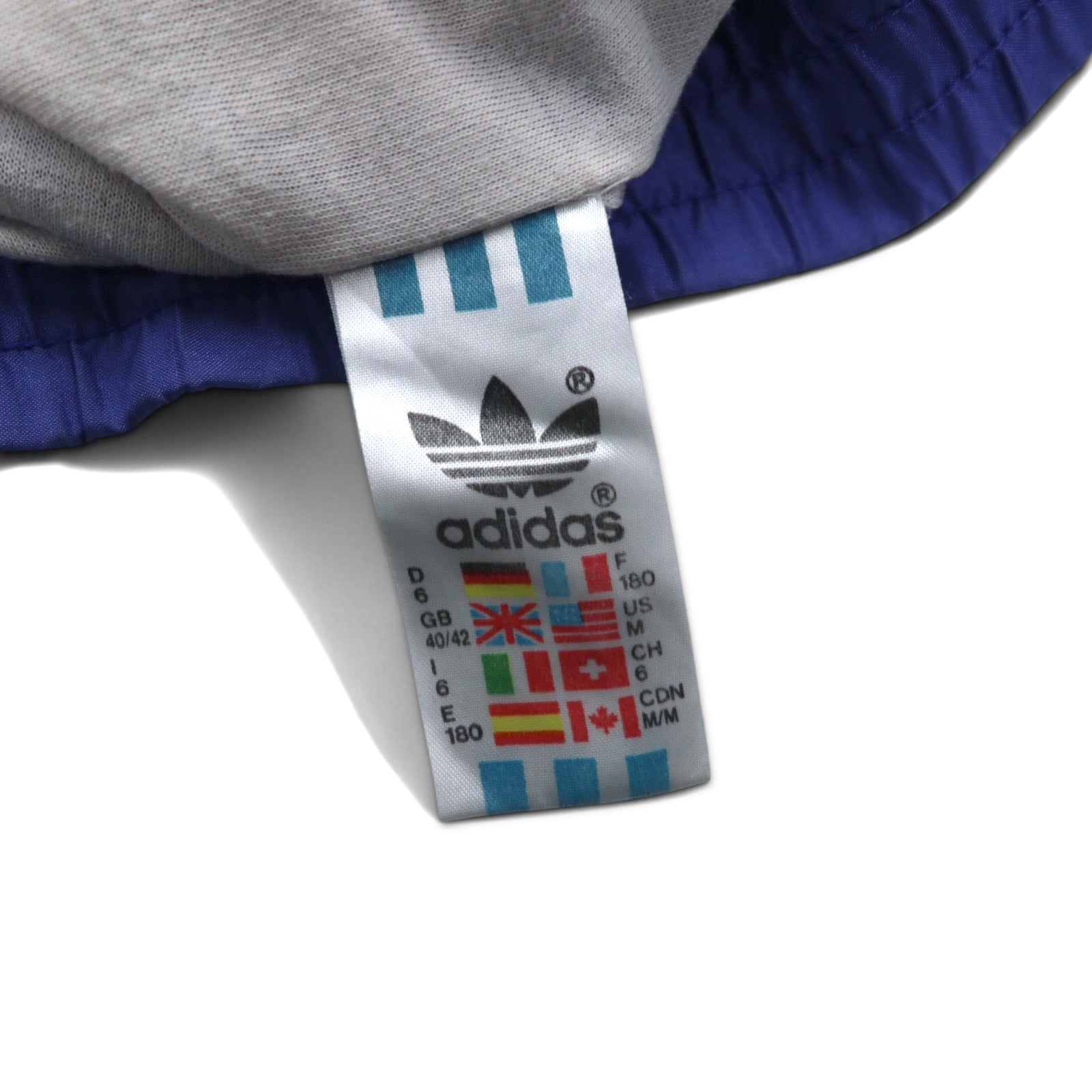 adidas Giacca da pista in nylon anni '90, taglia M, blu, logo ricamato a trifoglio, etichetta argentata