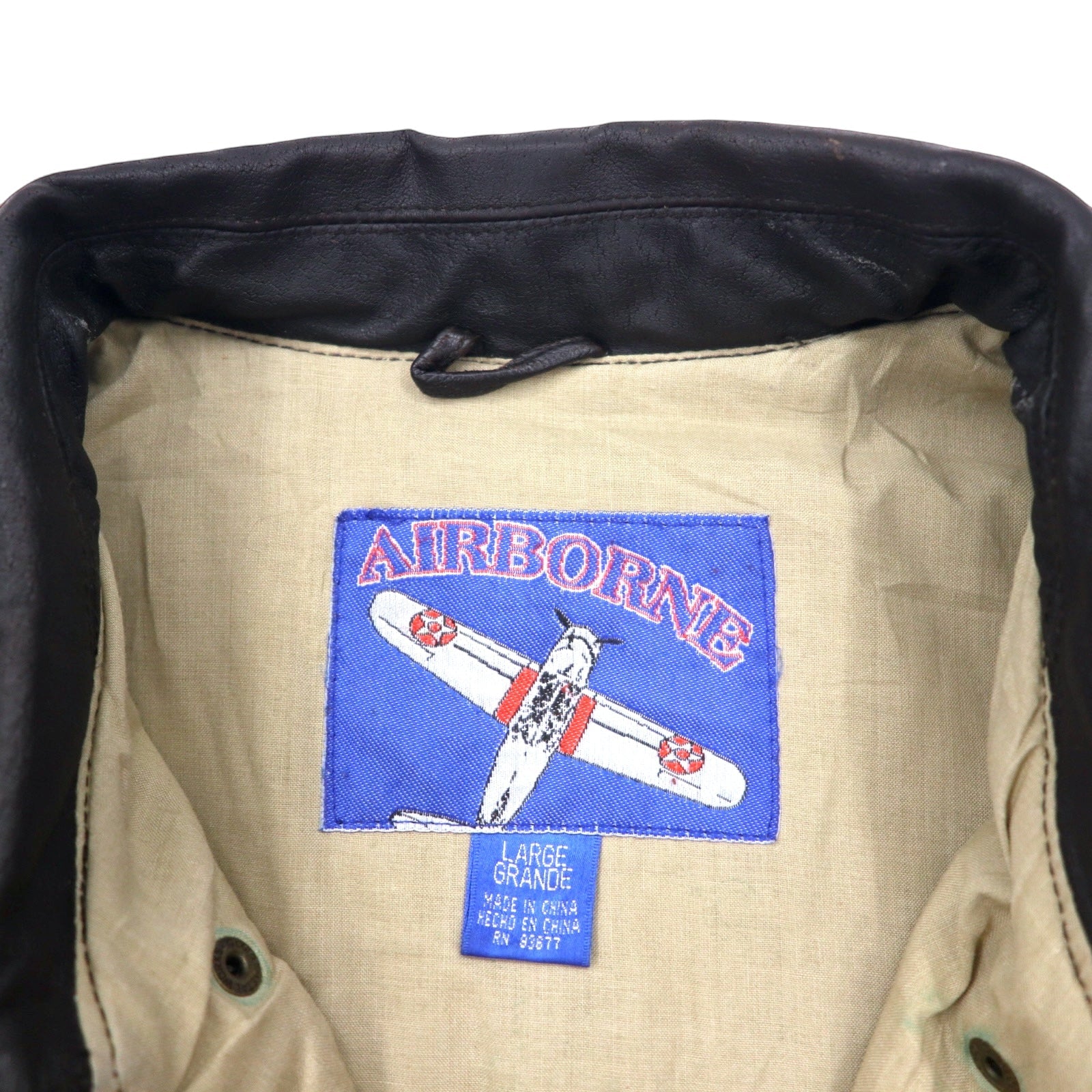 Giacca da aviatore AIRBORNE in pelle A-2 L marrone con bandiera americana