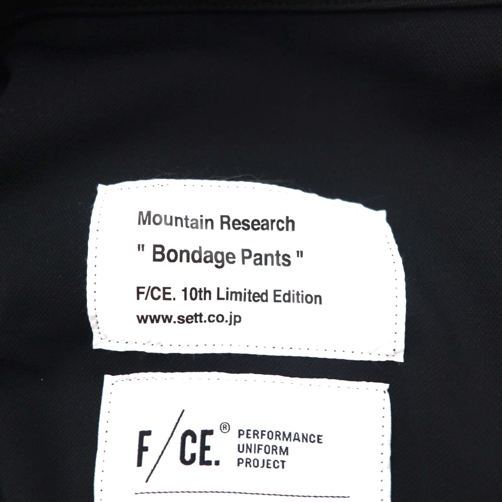 F/CE. × MOUNTAIN RESEARCH Pantaloni bondage S neri SOLOTEX BONDAGE PANTS 10THFMR001