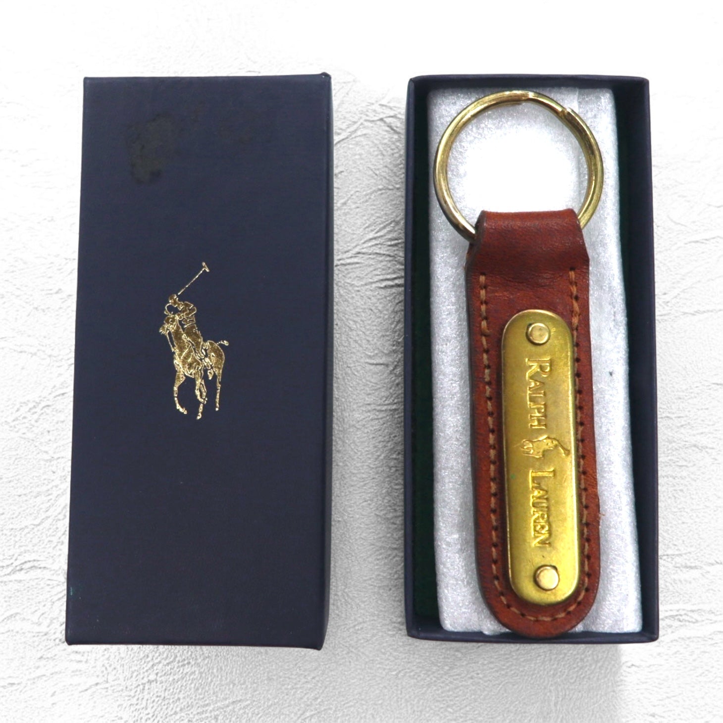 RALPH LAUREN USA Portachiavi in pelle marrone con placca in metallo, mai usato