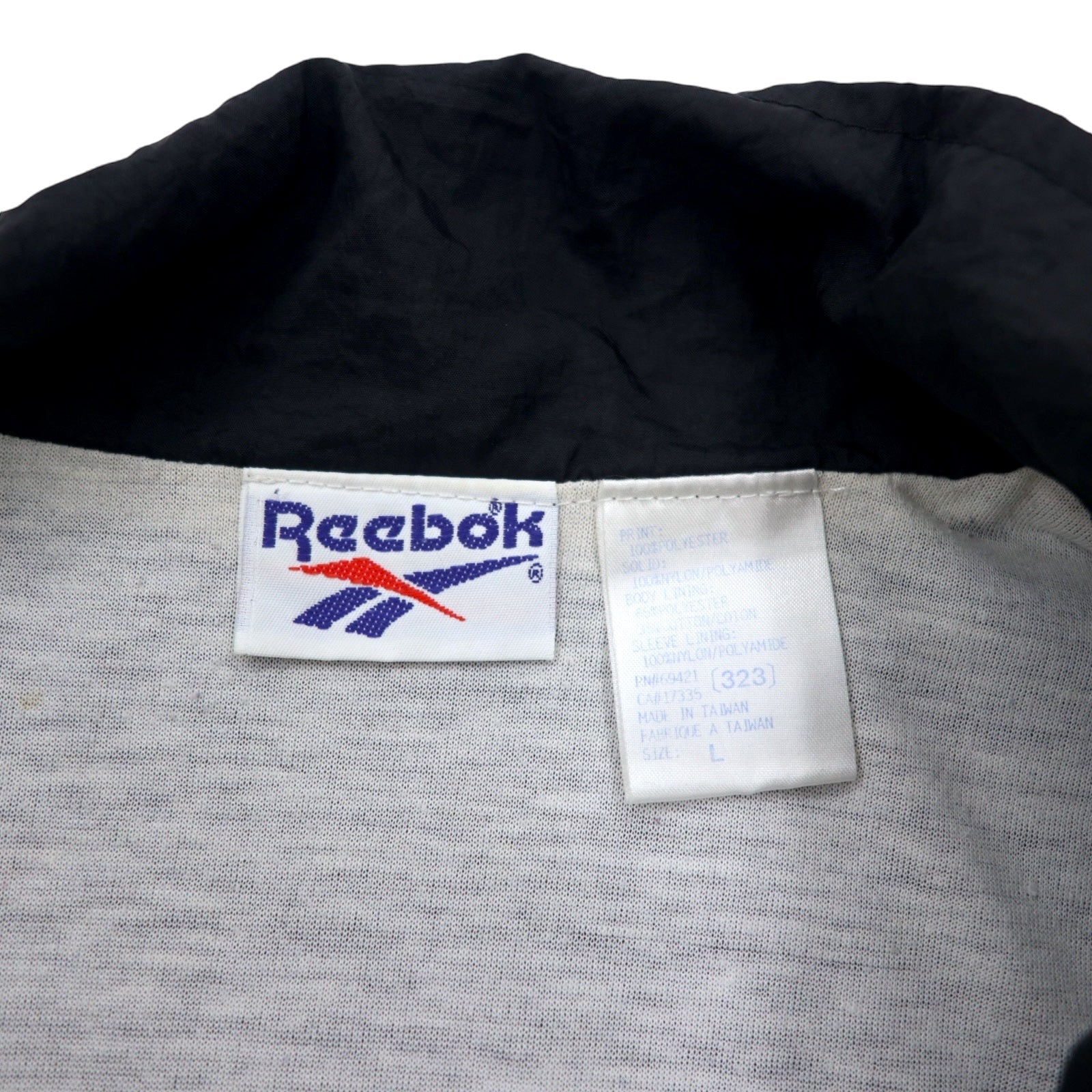 Giacca in nylon Reebok anni '90, maglia sportiva L nera, poliestere con logo vettoriale