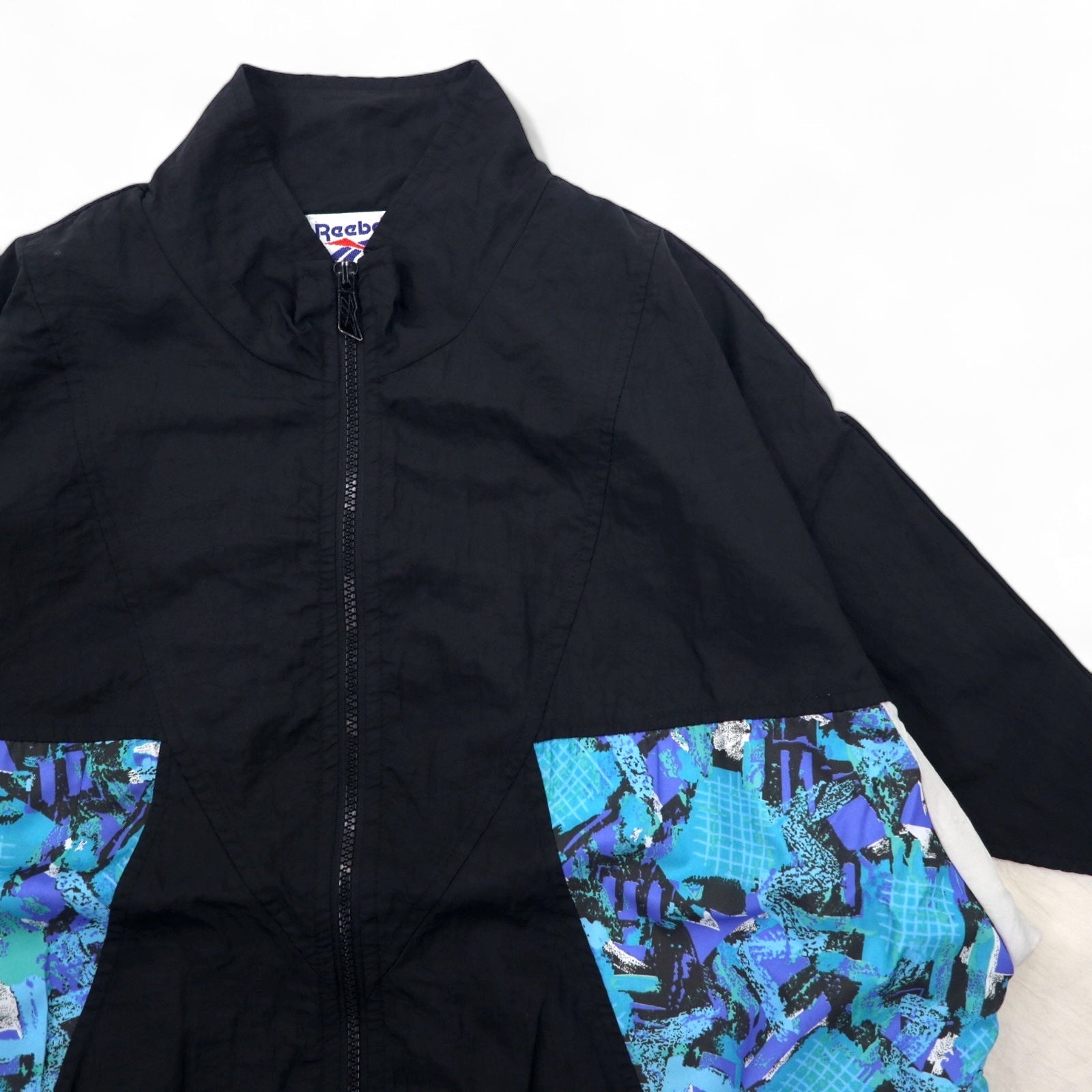 Giacca in nylon Reebok anni '90, maglia sportiva L nera, poliestere con logo vettoriale